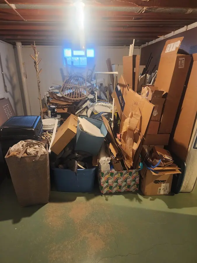 Roll-off dumpster container at job site for Concrete Dumpster Rental in Logan